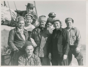 Image: Members of crew of oil tanker at Killinek, with Miriam MacMillan